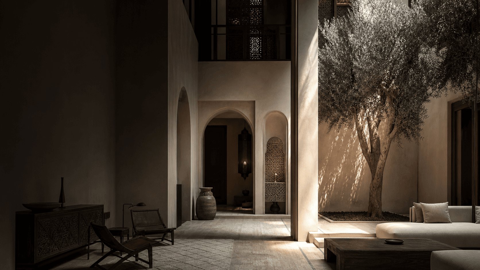 Contemporary Moroccan riad interior with arches and warm natural light